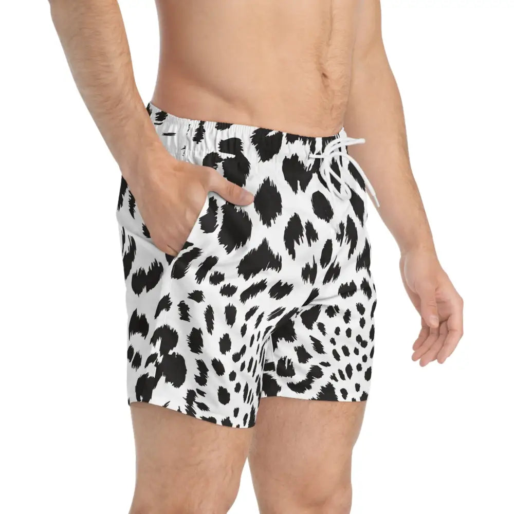 Men’s swim trunks featuring Dalmatian print in white leopard pattern by PixiOnyx