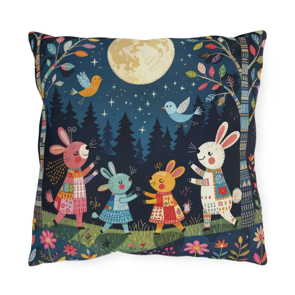 Whimsical outdoor cushion with rabbits and birds dancing under a full moon for woodland picnic nook
