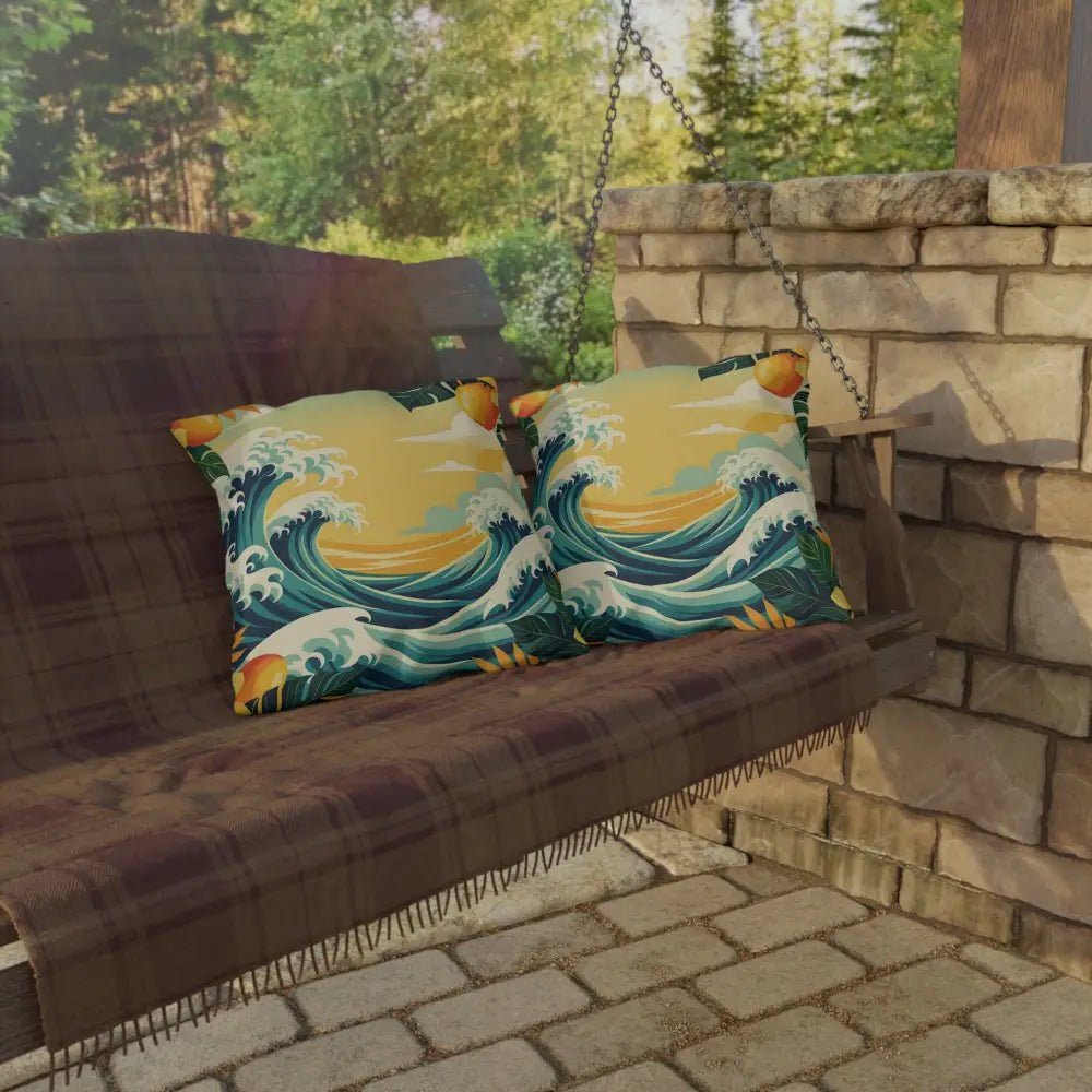Outdoor pillow with wave pattern pillows on a swing at PixiOnyx Mango Coast Cushion