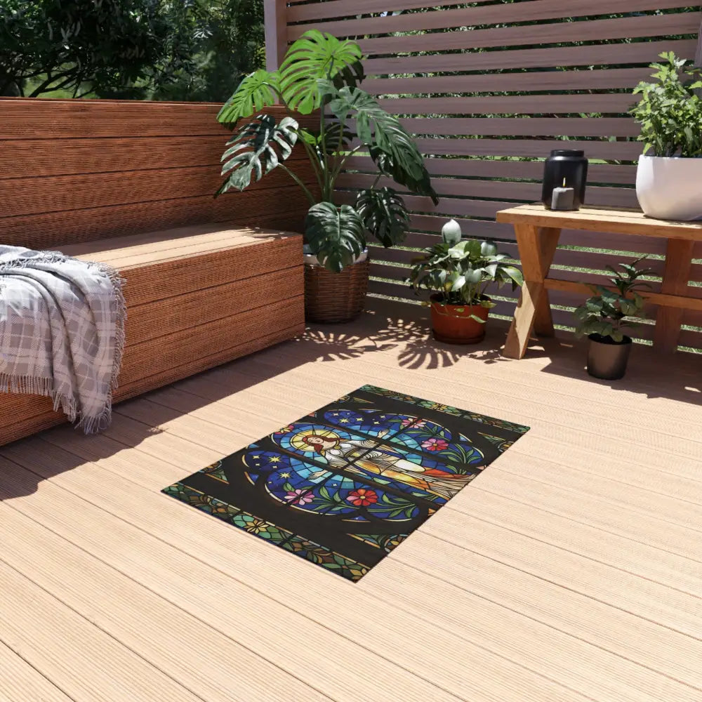 Stained glass patterned outdoor rug from PixiOnyx Bohemian Patio Accent collection