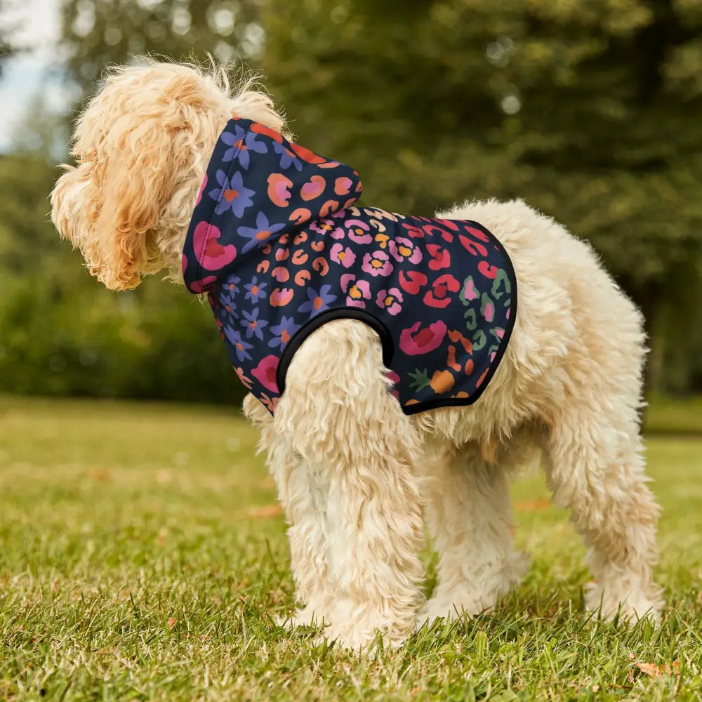 Floral-patterned dog hoodie from PixiOnyx Bold Petwear featuring vibrant colorful floral design