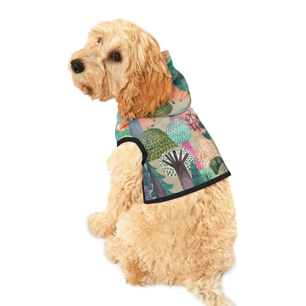 Dog wearing a colorful tree-patterned hoodie from Pet Hoodie – Colorful Woodland Camo PixiOnyx Bold Petwear