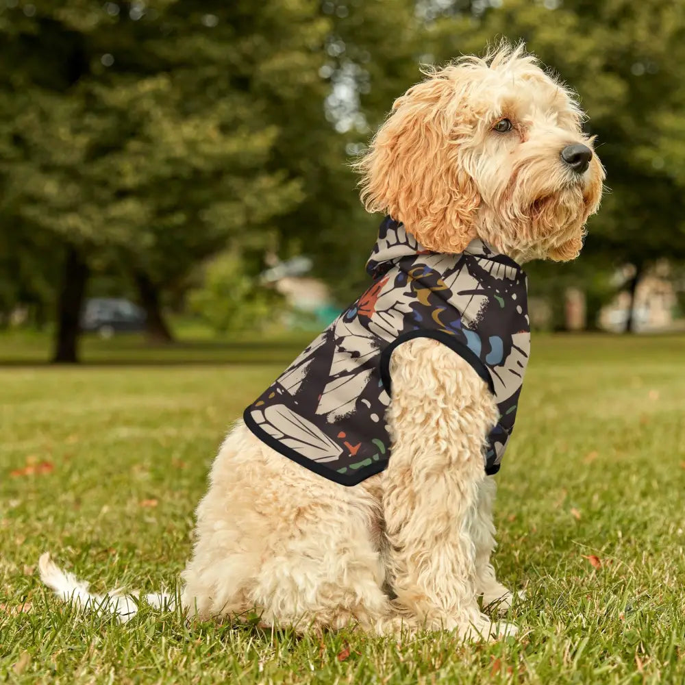 Dog wearing butterfly-patterned hoodie from PixiOnyx Surreal Woodlandwear Pet Hoodie Fluttercore