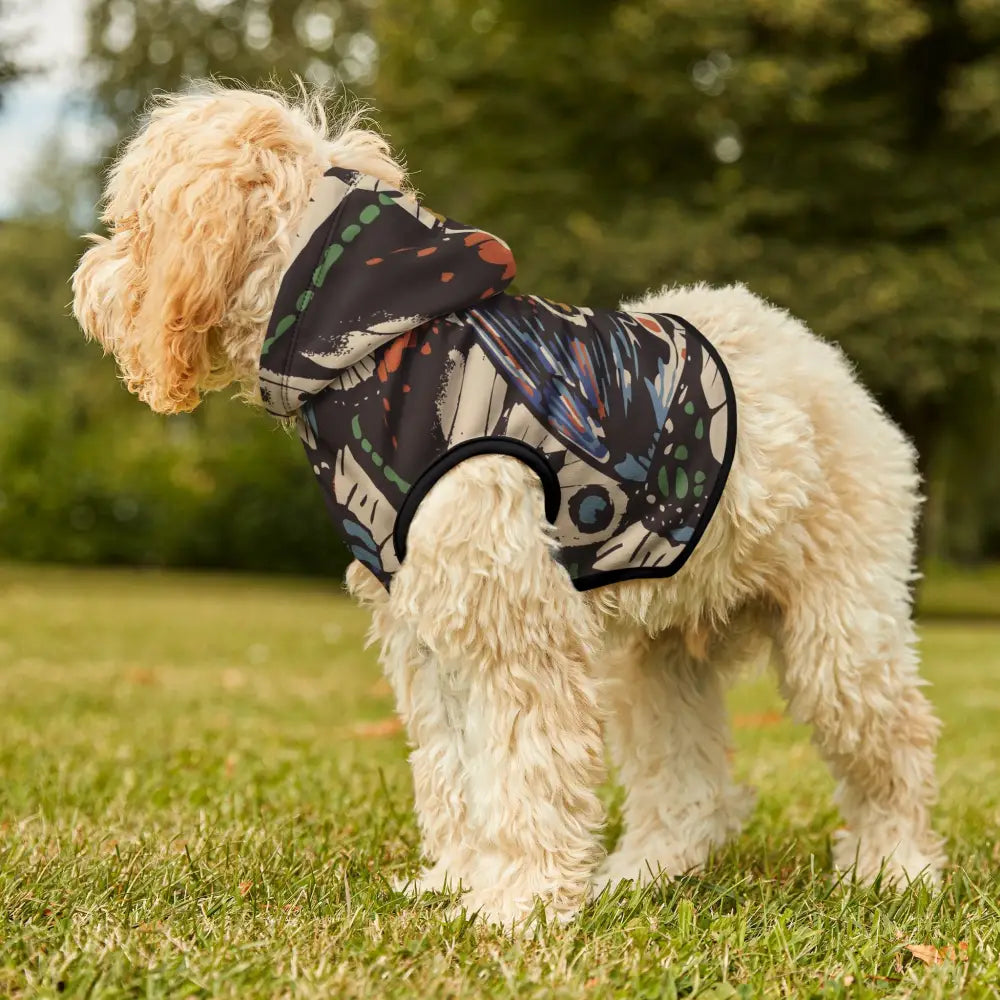 Dog wearing a patterned hoodie from Pet Hoodie Fluttercore PixiOnyx Surreal Woodlandwear