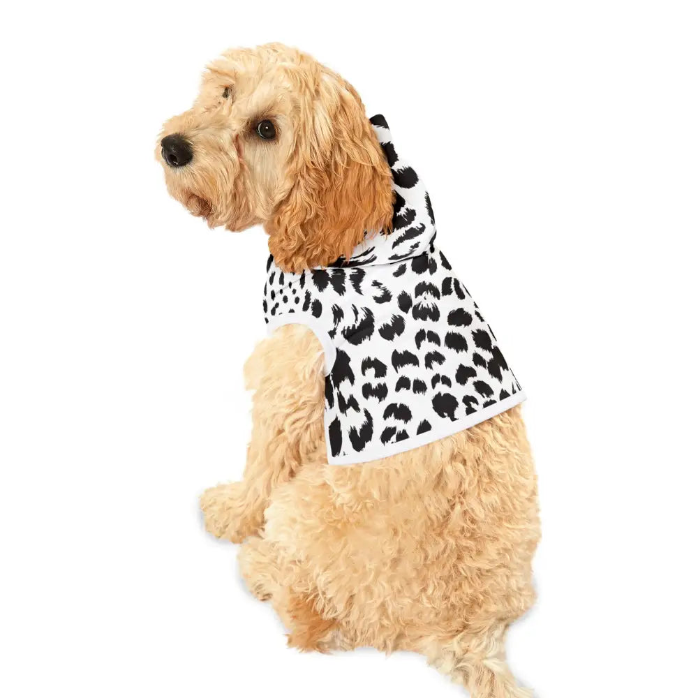 Dog wearing a black and white leopard print Pet Hoodie from PixiOnyx Wildwear Edition