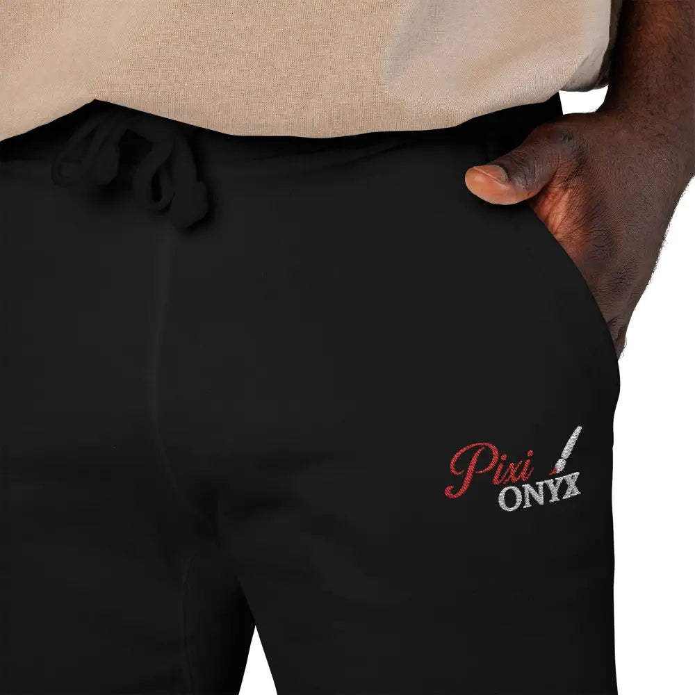 Black PixiOnyx Cozy Unisex fleece sweatpants with logo on thigh, easy care instructions