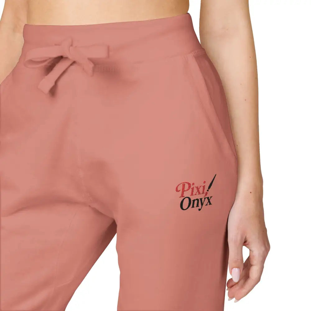 Pink unisex fleece sweatpants with drawstring for cozy relaxation and casual wear
