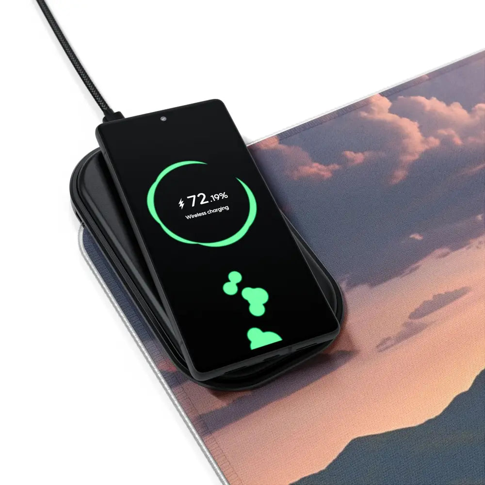 Wireless charging smartphone on RGB Wireless Charging Mousepad PixiOnyx Dreamscape Vibe