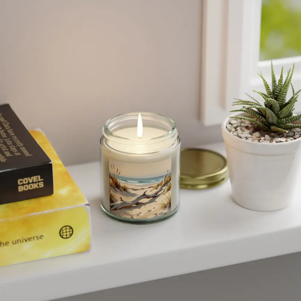 Beach-themed scented candle in a glass jar from PixiOnyx Coastal Calm Series