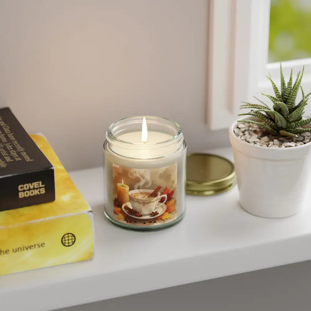 Lit candle in glass jar with coffee cup design for PixiOnyx Aromatherapy Accent