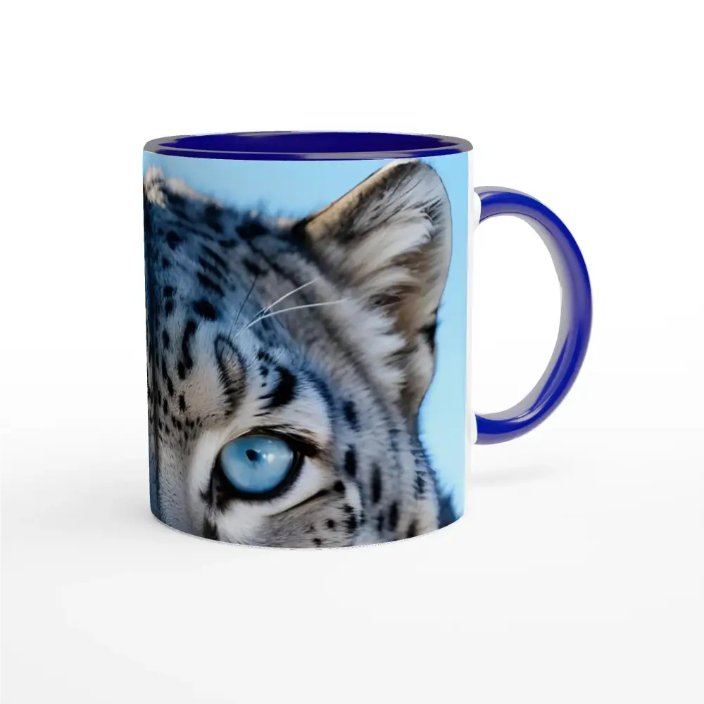 Blue-rimmed mug with snow leopard print from PixiOnyx Glacier Gaze collection