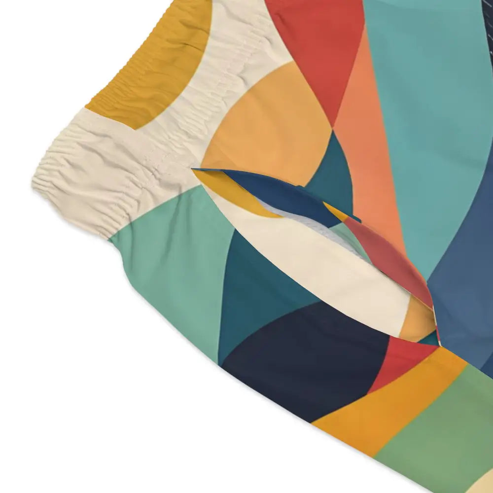 Abstract geometric patterned fabric for Sunset Grove Swim Trunks by PixiOnyx Festivalwear