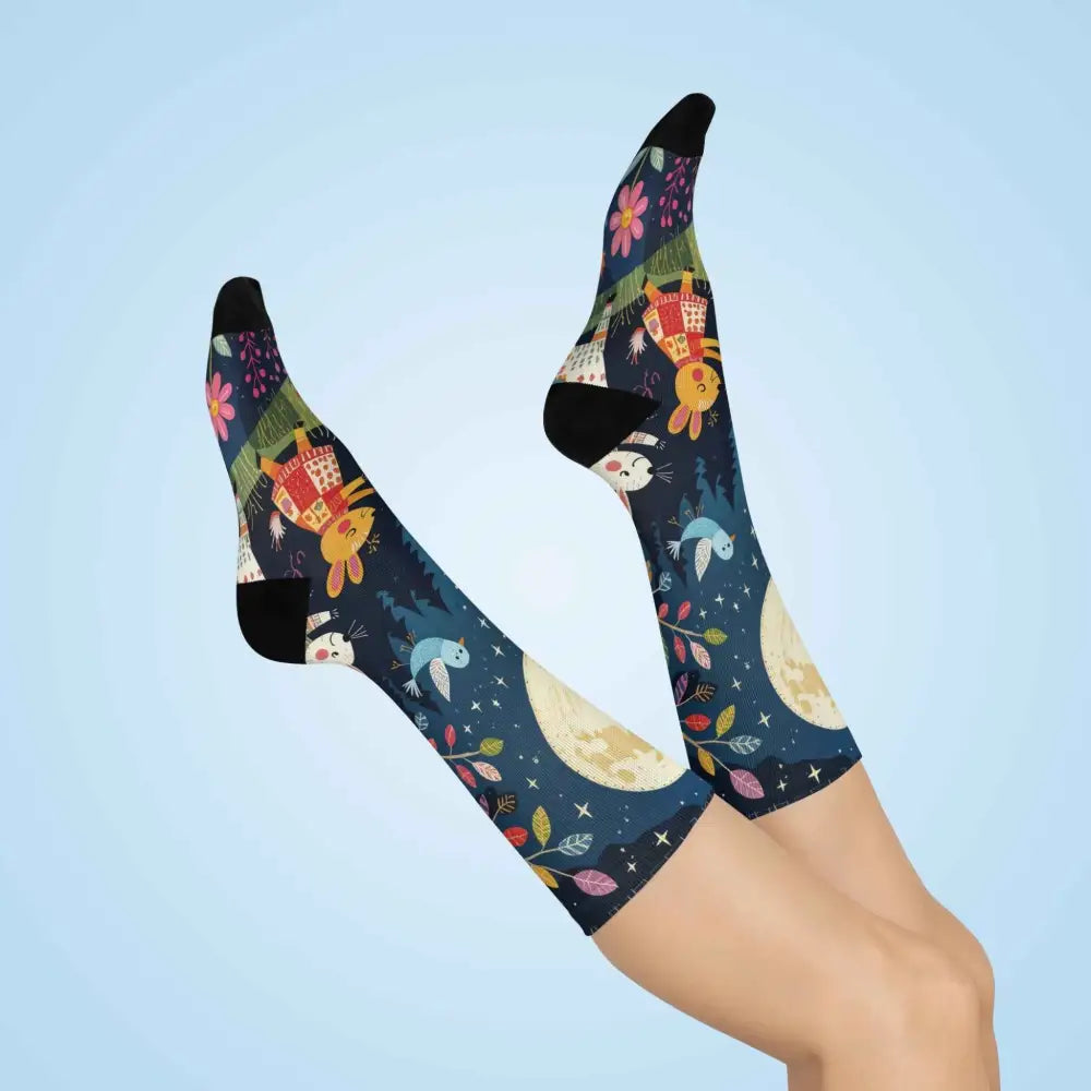 Dark blue folk art forest creature socks with bunnies birds moon and colorful leaves