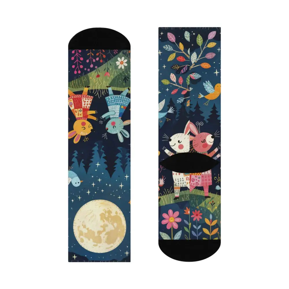 Whimsical folk art forest creature socks with rabbits, full moon, and forest scenery