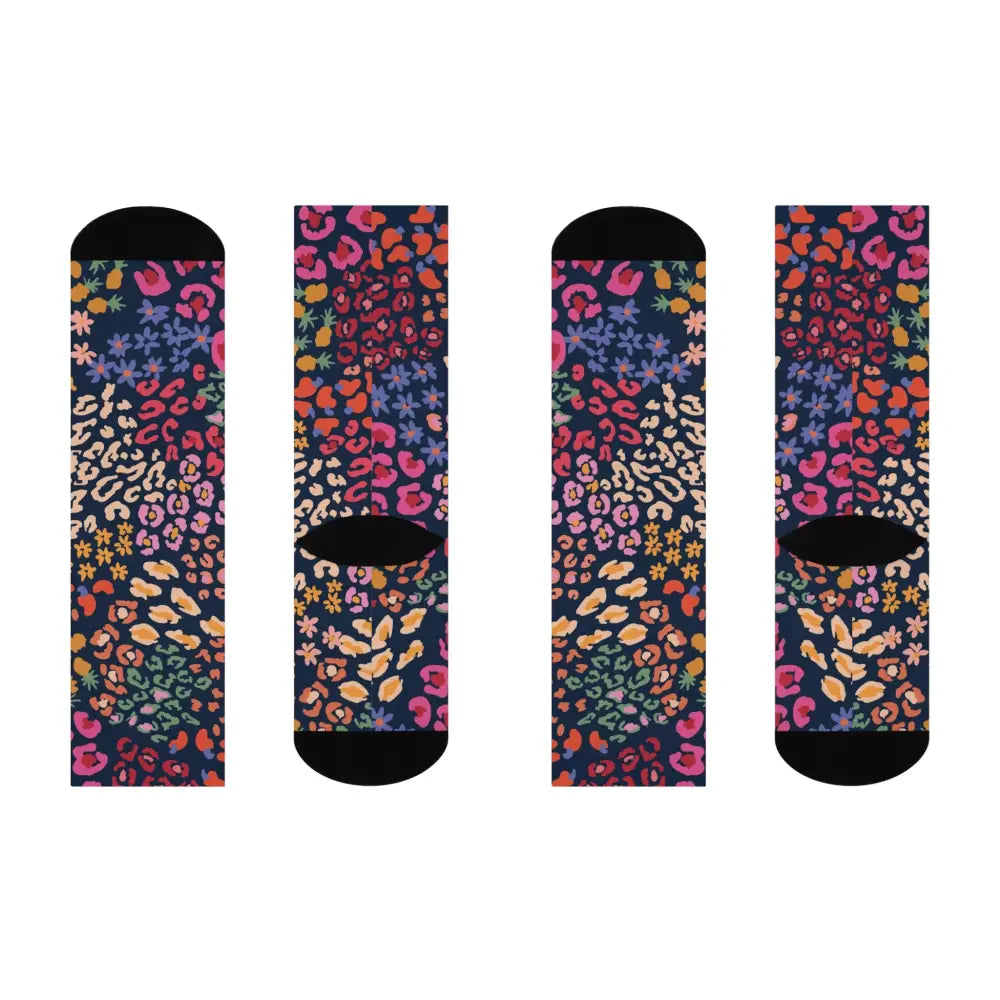 Four dark blue cushioned crew socks with vibrant pebble pattern and colorful leopard print