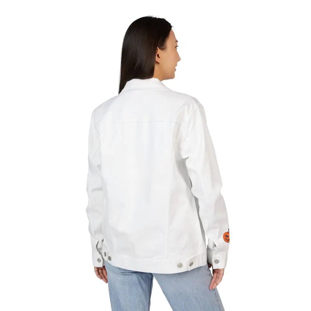 Woman in white denim jacket and light-wash jeans seen from behind for PixiOnyx Outerwear Halloween Statement