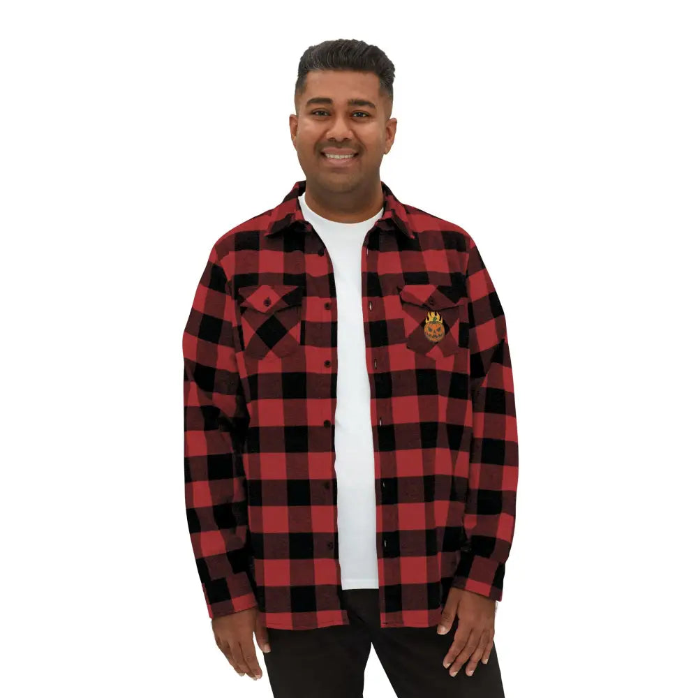 Red and black plaid flannel shirt with flaming pumpkin emblem, perfect for Halloween by Trading Company EXP50F