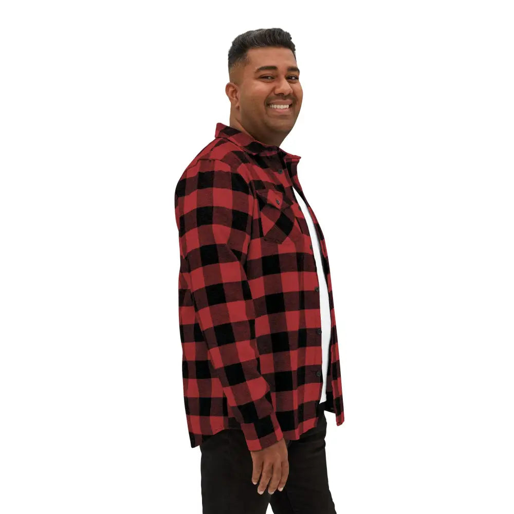 Man wearing a flaming pumpkin Halloween flannel shirt with black pants from PixiOnyx