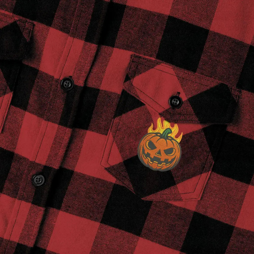 Red and black plaid flannel shirt with flaming pumpkin patch pocket for Halloween style