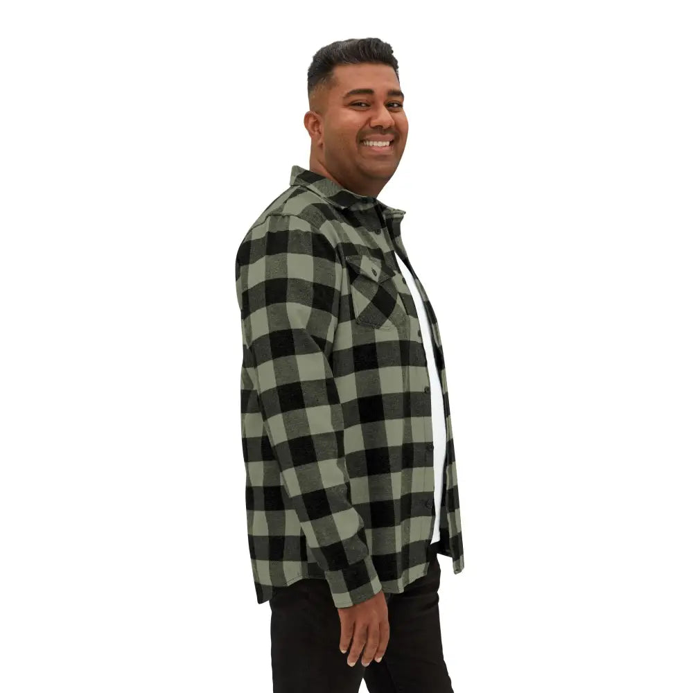 Man in black and grey plaid flannel shirt with flaming pumpkin design from PixiOnyx