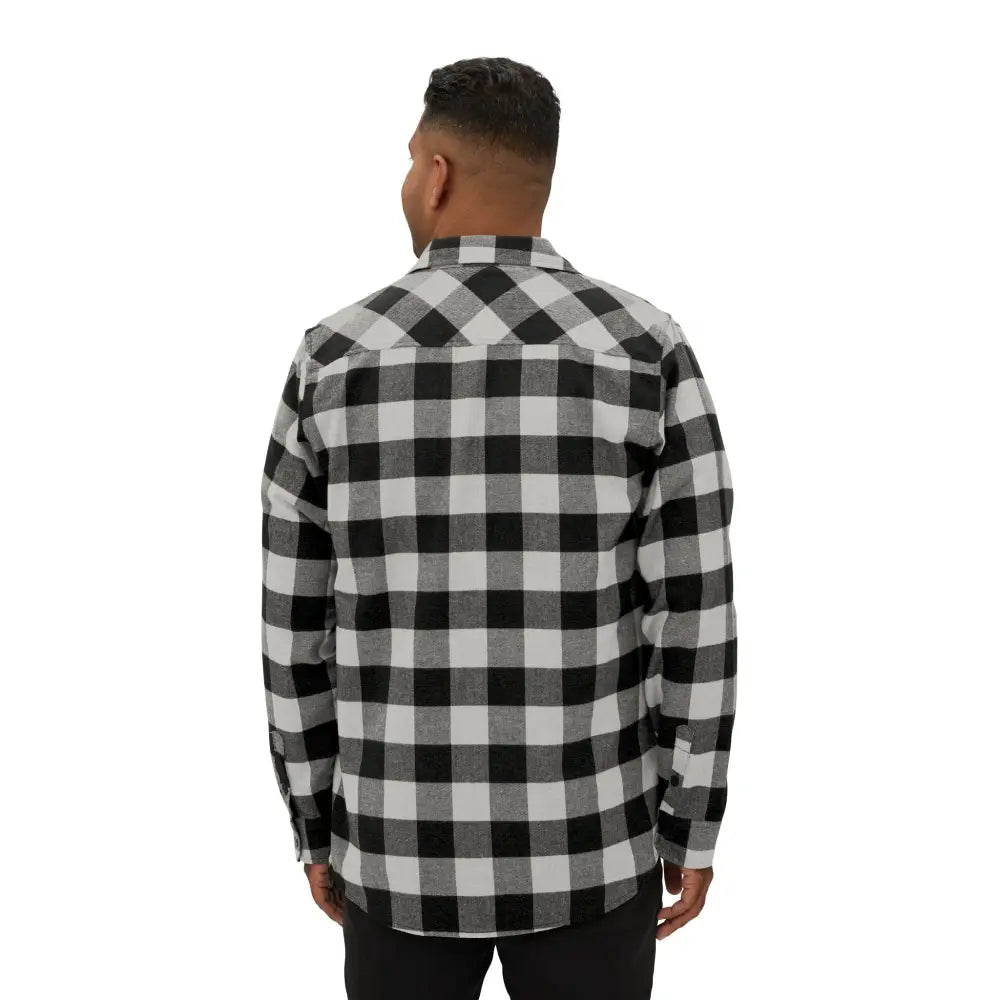 Men’s black and white buffalo plaid flannel shirt with flaming pumpkin design from PixiOnyx