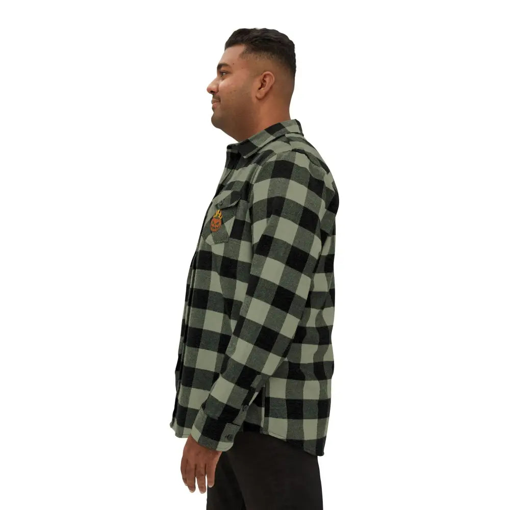 Men’s gray and black plaid flannel shirt with flaming pumpkin design from Trading Company EXP50F