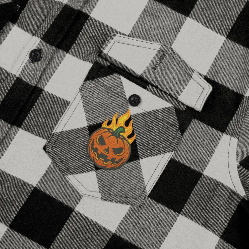 Black and white plaid flannel shirt with flaming pumpkin pin for Halloween by PixiOnyx