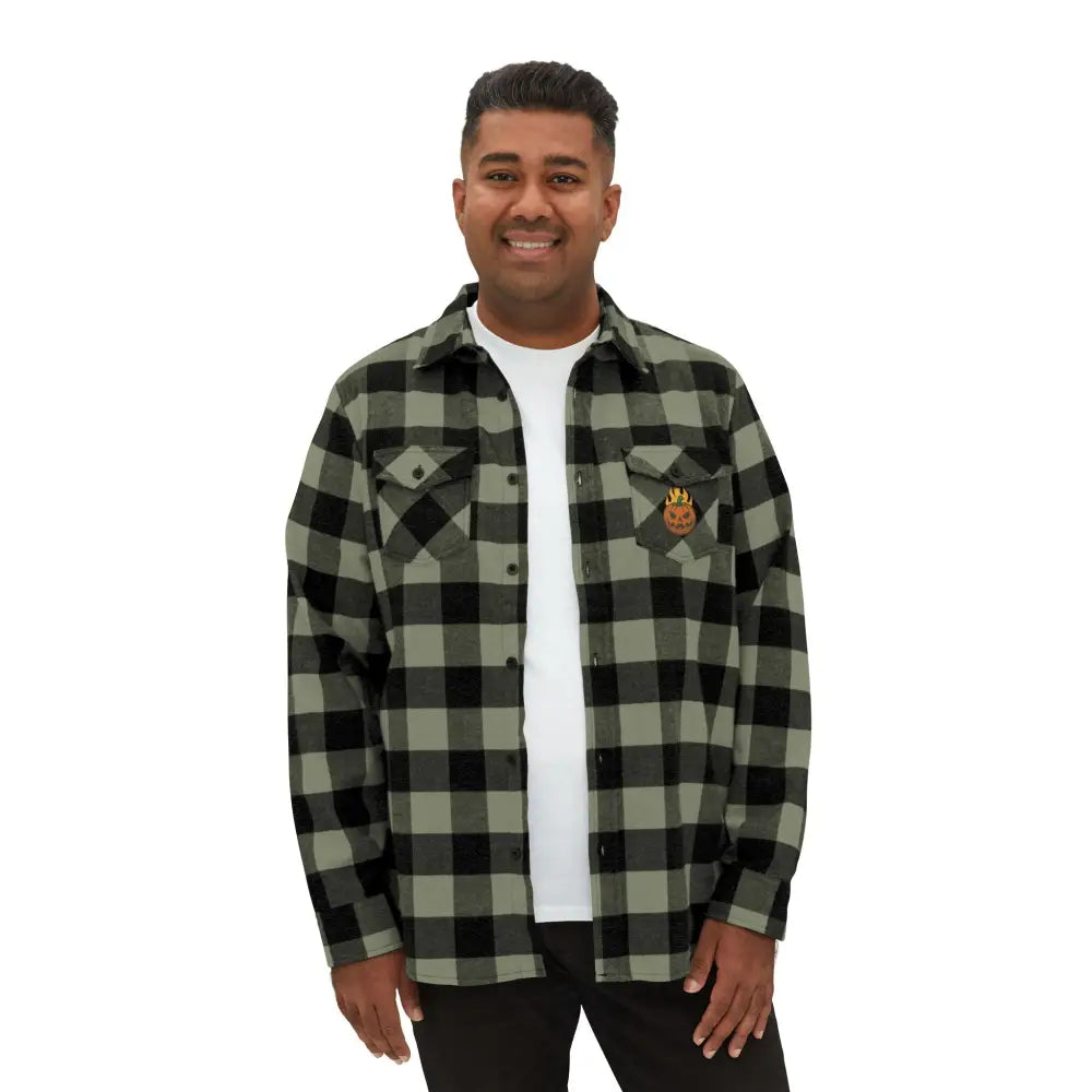 Men’s black and gray plaid flannel shirt with flaming pumpkin emblem, perfect for Halloween