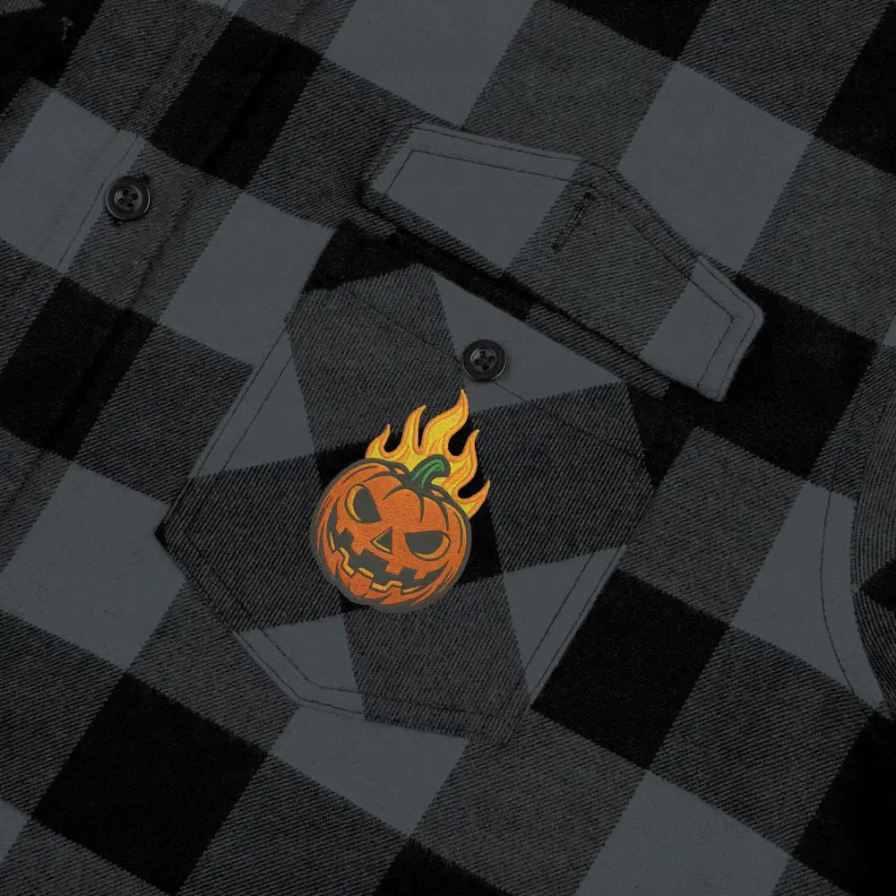 Black and grey plaid flannel shirt with flaming pumpkin pin from PixiOnyx Halloween edition