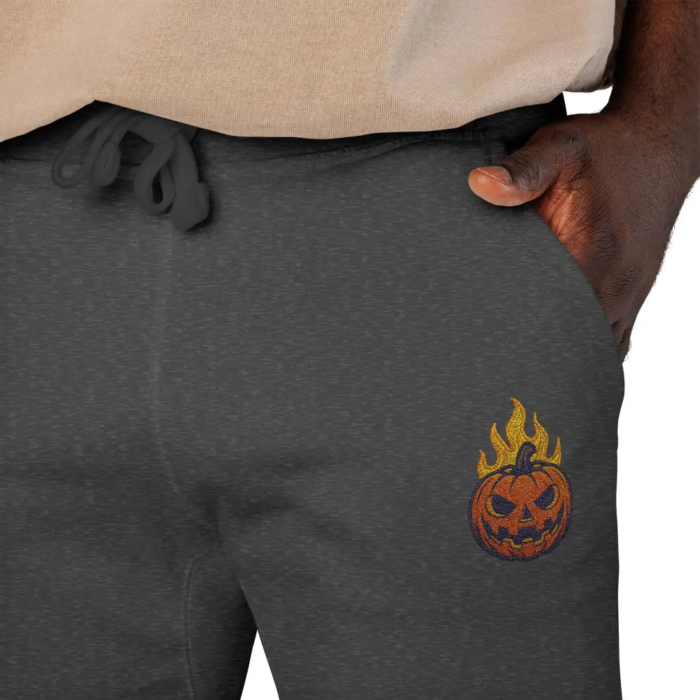 Dark gray fleece sweatpants with flaming pumpkin design for cozy Halloween streetwear