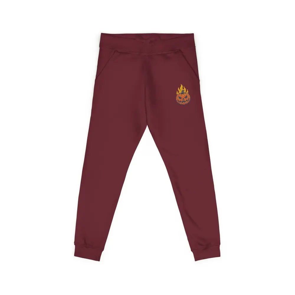 Maroon fleece sweatpants with flaming pumpkin and flame design for cozy Halloween style