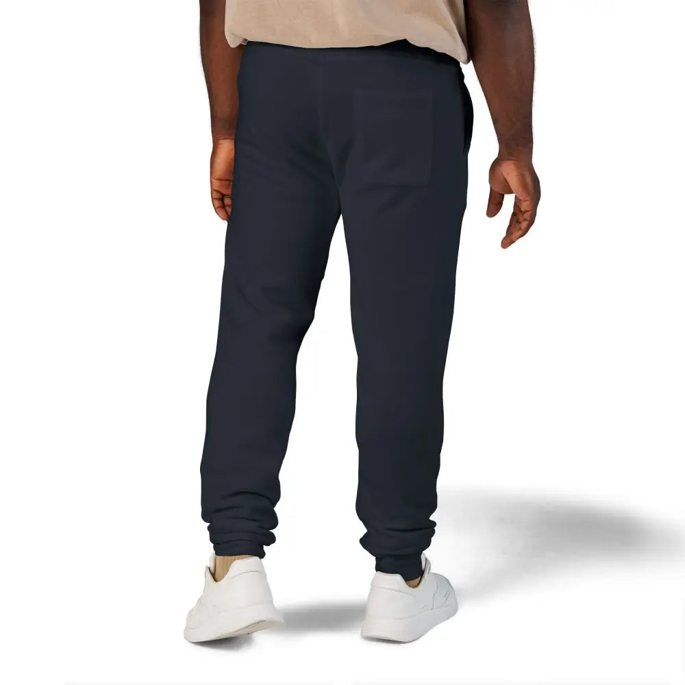 Unisex fleece sweatpants with flaming pumpkin design and white sneakers for cozy Halloween style