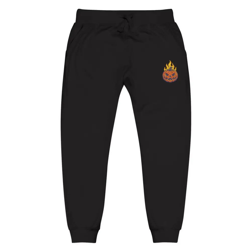 Black fleece sweatpants with flaming pumpkin design for cozy Halloween streetwear