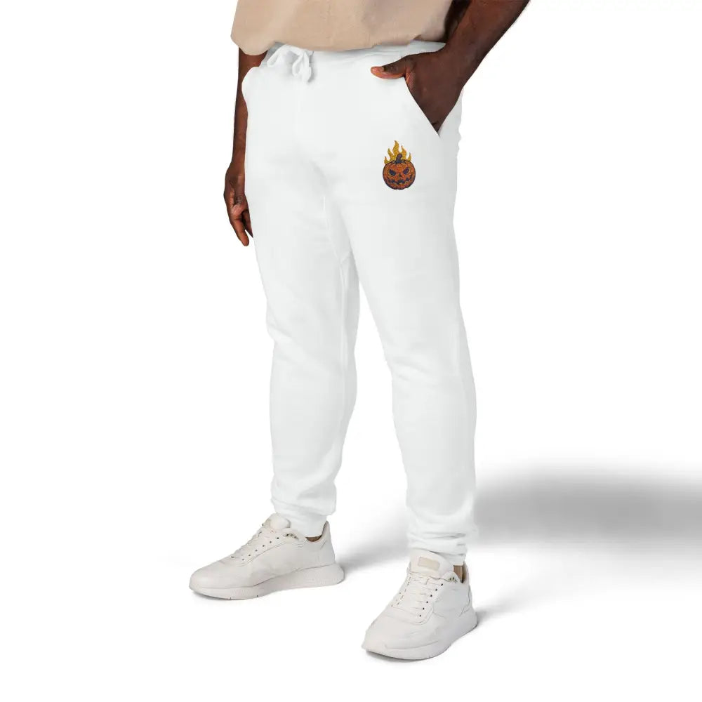 Men’s fleece sweatpants with flaming pumpkin graphic on left thigh for Cozy Halloween style
