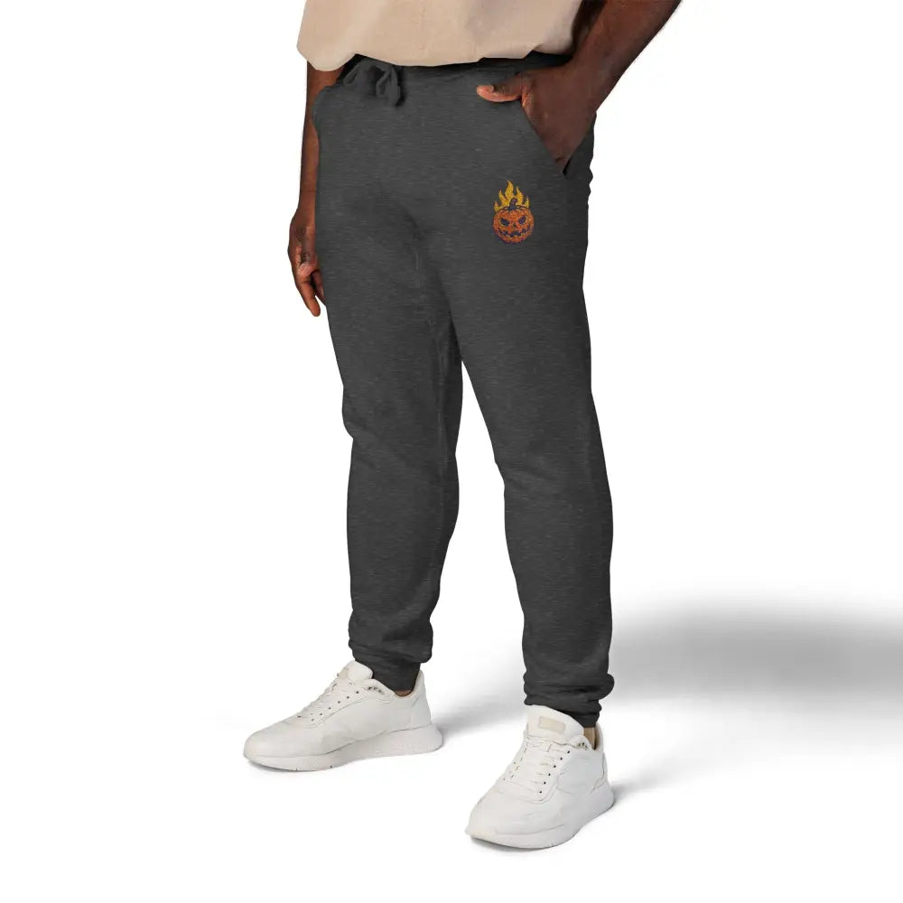 Dark gray fleece sweatpants with flaming pumpkin graphic on left thigh for cozy Halloween style