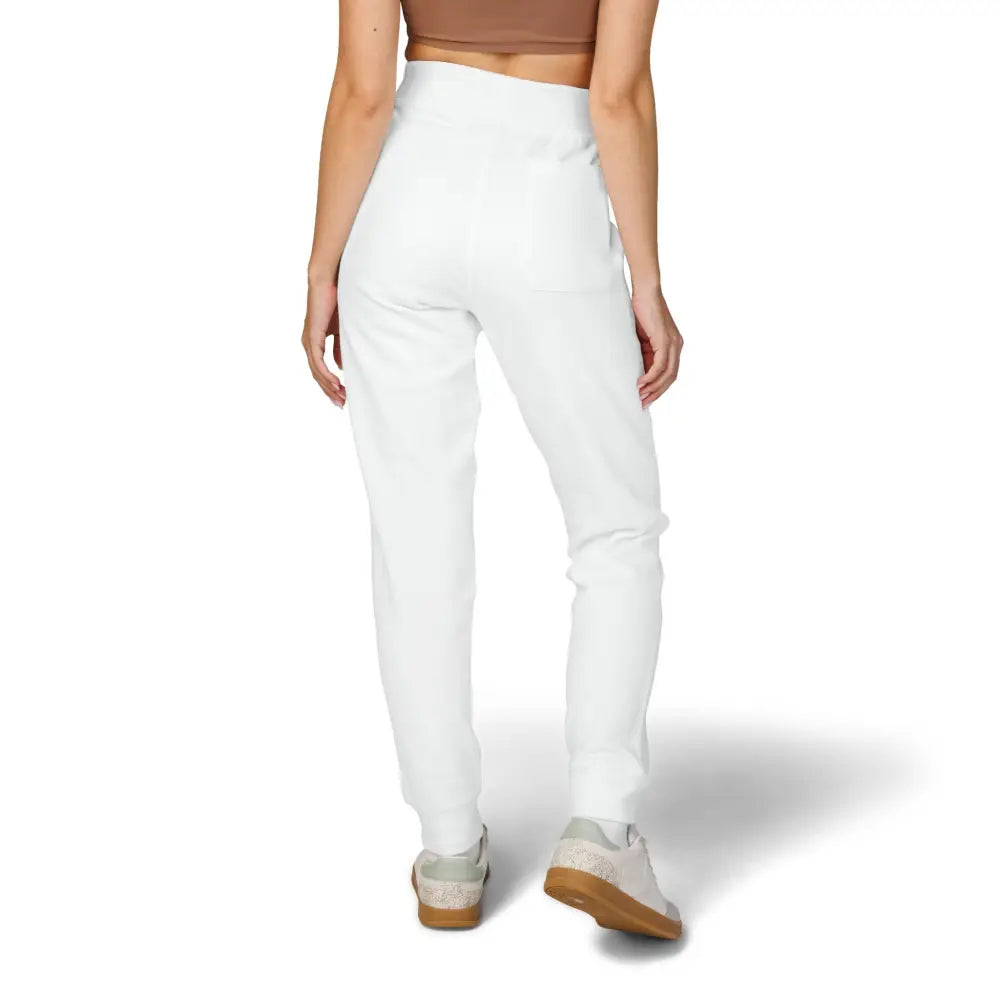 Women’s white high-waisted tapered fleece sweatpants with flaming pumpkin design for cozy Halloween streetwear