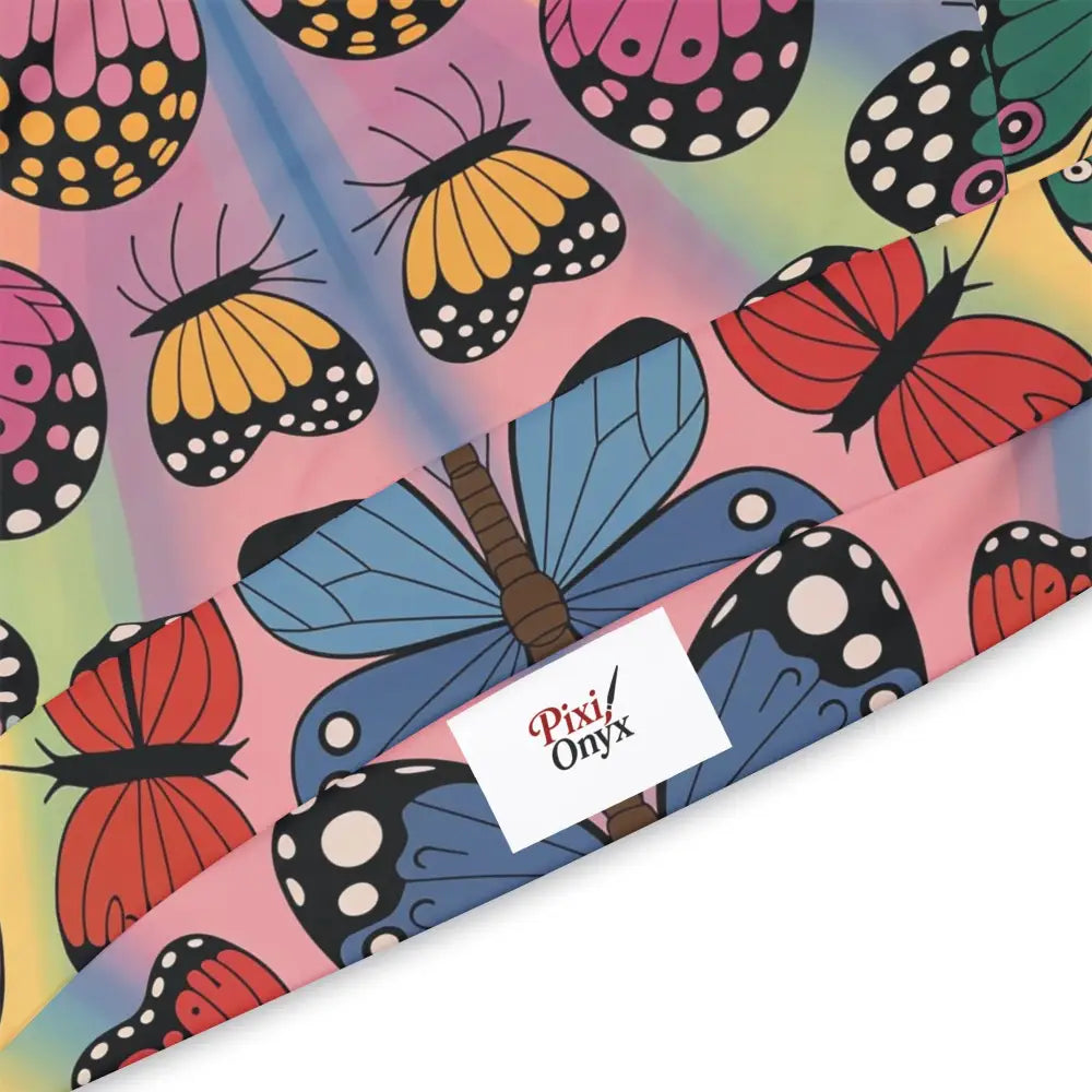 Fabric with colorful butterfly pattern for Unisex Hoodie Kaleidoscope Flight merges athletic versatility