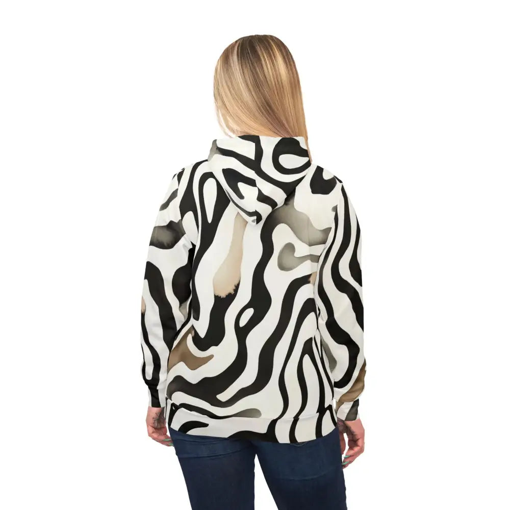 Zebra-striped hooded sweatshirt from PixiOnyx Surreal Patternwear Unisex Hoodie Monochrome Melt