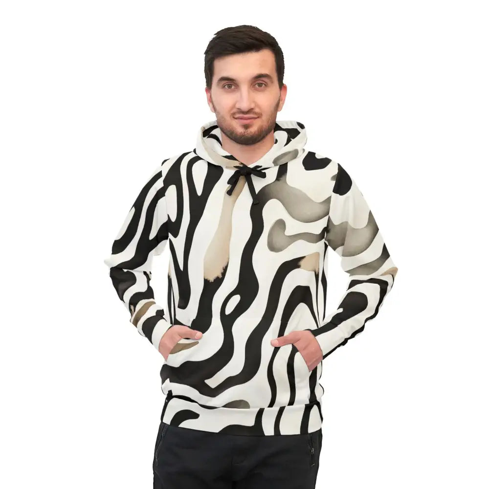 Man wearing a zebra-striped hoodie from PixiOnyx Surreal Patternwear Unisex Hoodie Monochrome Melt