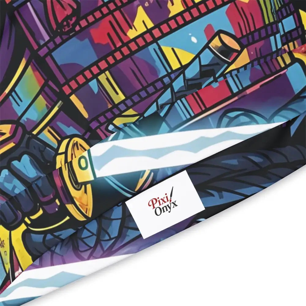 Colorful graphic print fabric with Pixi Onyx label on Samurai Splash drip meets discipline hoodie