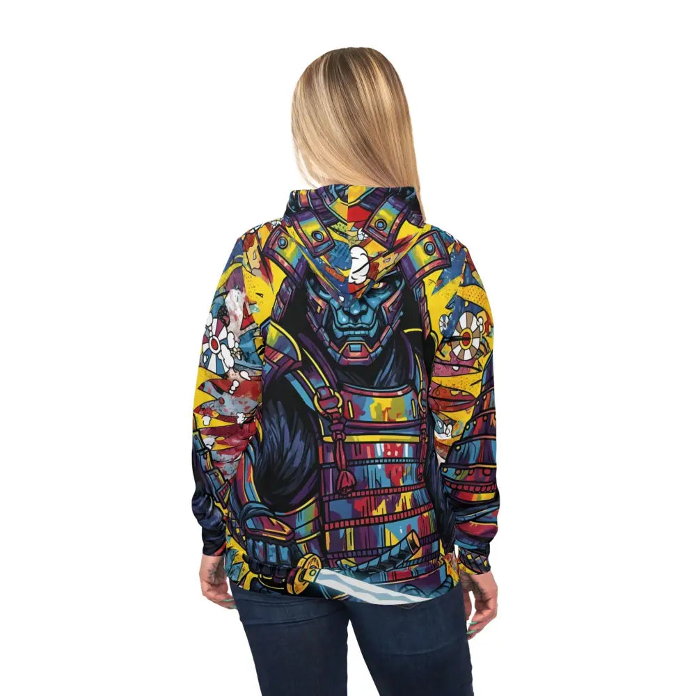 Woman in colorful Samurai Splash Hoodie with dark pants showcasing drip meets discipline style
