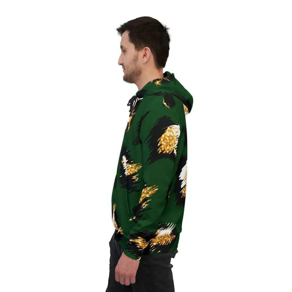 Man wearing a green patterned hoodie from PixiOnyx Junglecore Energy collection