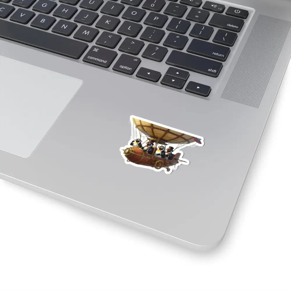 Steampunk penguin airship sticker on PixiOnyx glossy vinyl for whimsical skybound decor