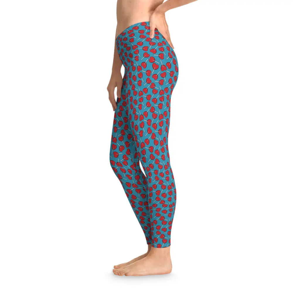 Blue leggings with red lollipop pattern from Womens Leggings Lick Me Later PixiOnyx Playwear