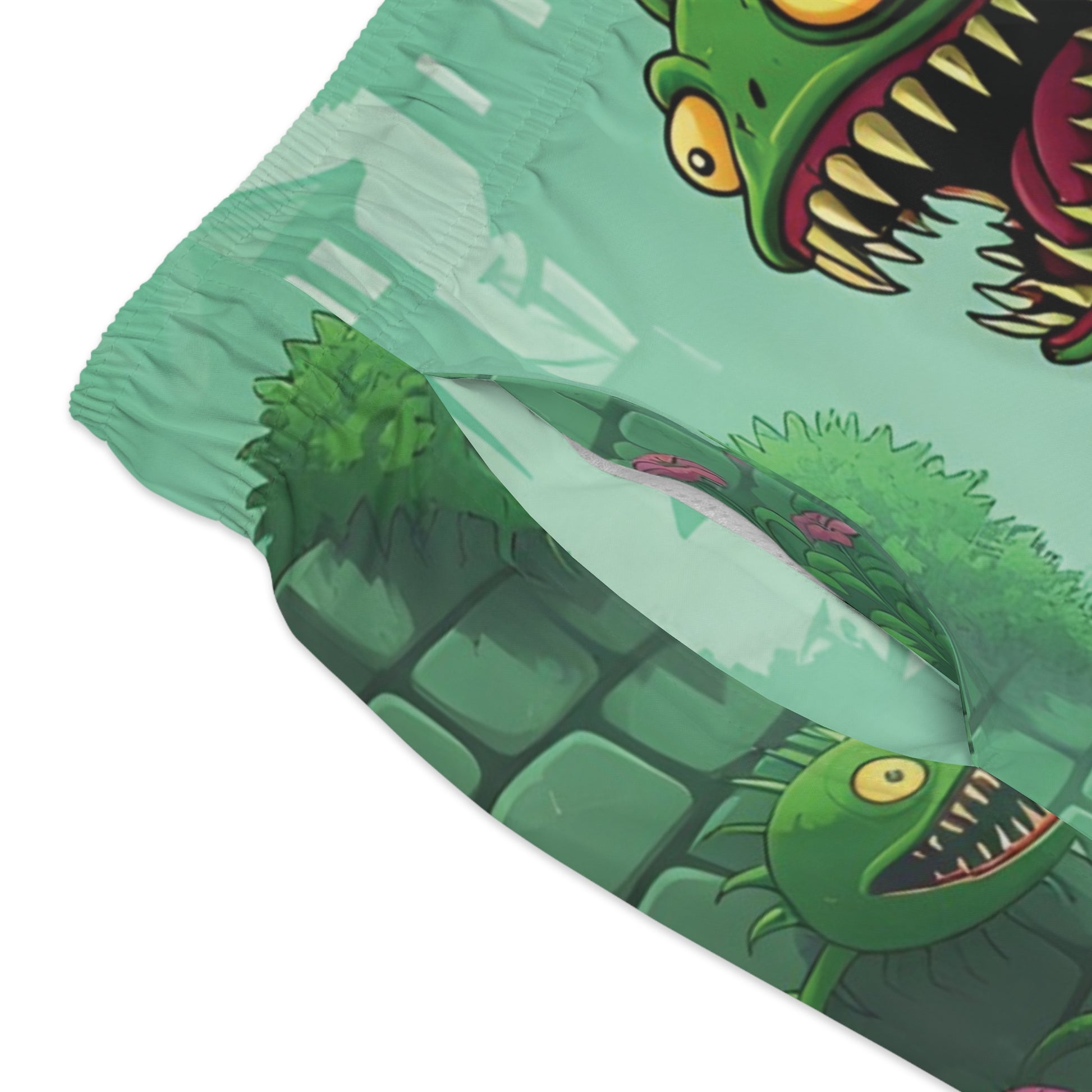 Cartoonish monster-themed pillow on Men’s Swim Trunks Grinvine Grove PixiOnyx fantasy wear