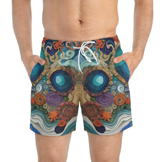 Men’s swim trunks with a colorful abstract skull design from PixiOnyx Coastal AOP Summerwear