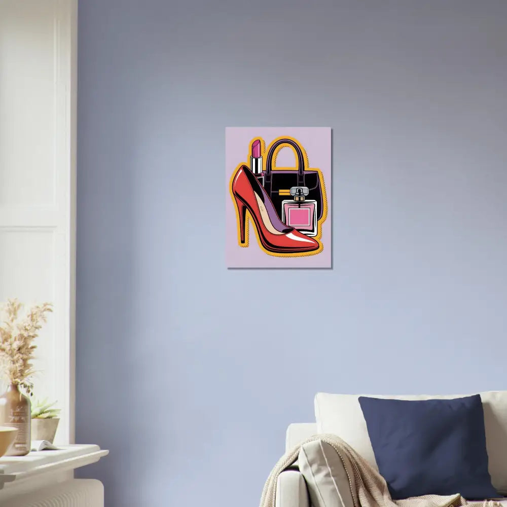 Vibrant glam slam brushed aluminum print of red high-heeled shoe, black handbag, and pink perfume bottle