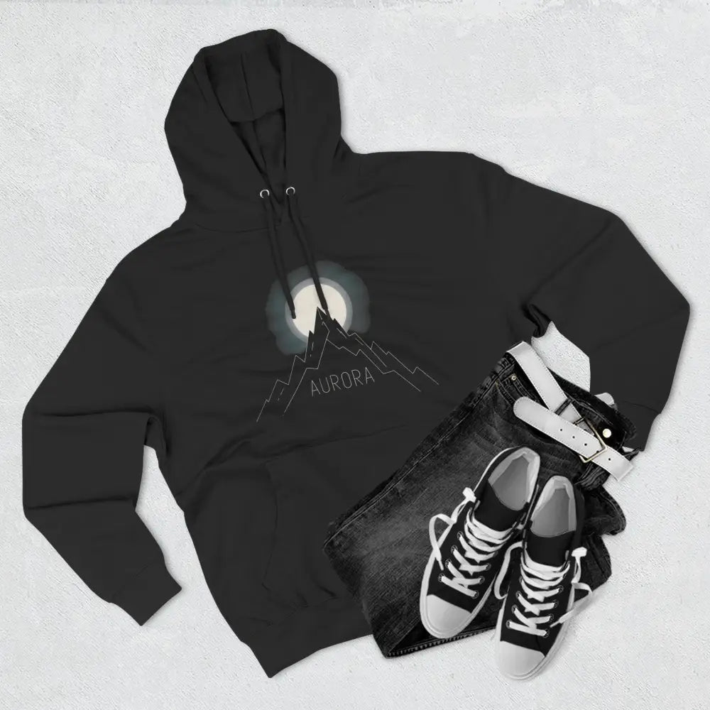 Black hooded sweatshirt with mountain and moon graphic, machine washable, low heat, cozy outdoor wear