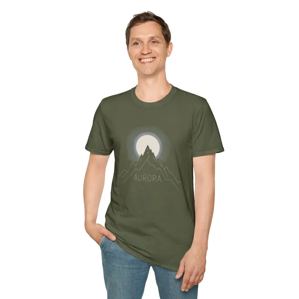 Man wearing olive green Aurora Mountain unisex softstyle T-shirt with mountain and moon graphic