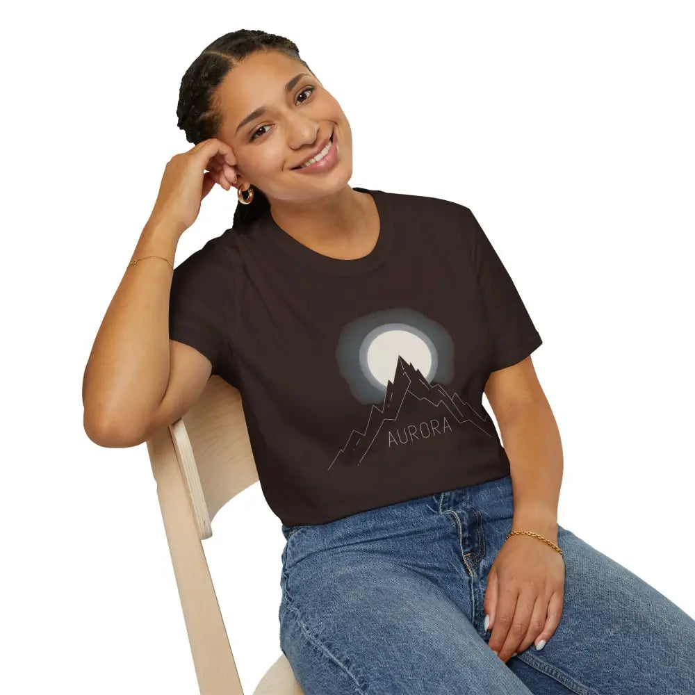 Woman wearing Aurora Mountain unisex T-shirt with mountain and moon design, ribbed collar